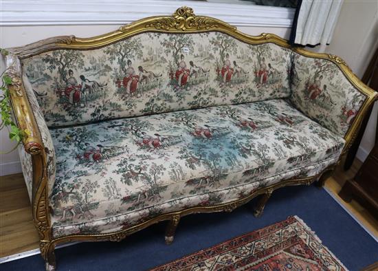 A carved giltwood three piece suite settee 6ft 6in.